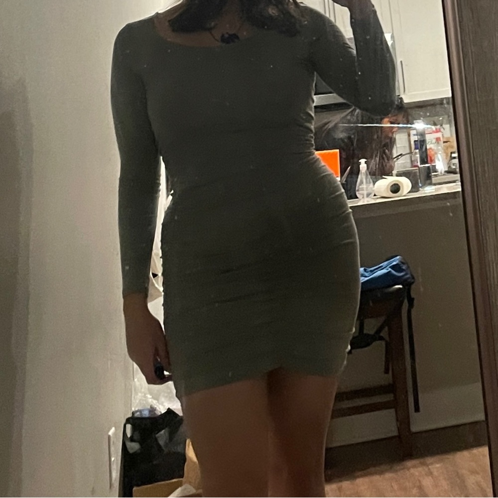H&M Small ruched bodycon dress in light green.